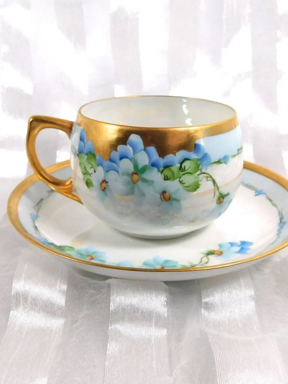 Blue Floral Teacup and Saucer with Gold Trim # 26310